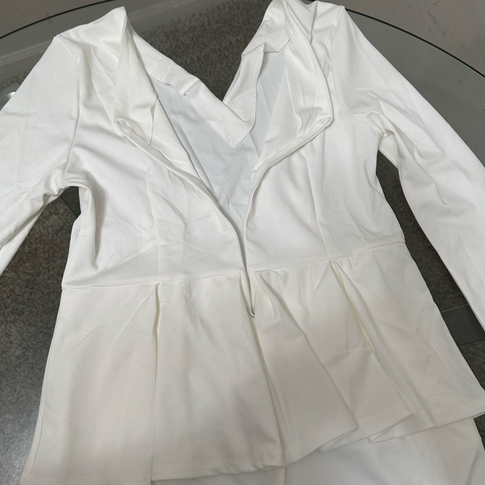 PEPLUM ONE PIECE JUMPSUIT WITH SIDE POCKETS. - Picture 10 of 13